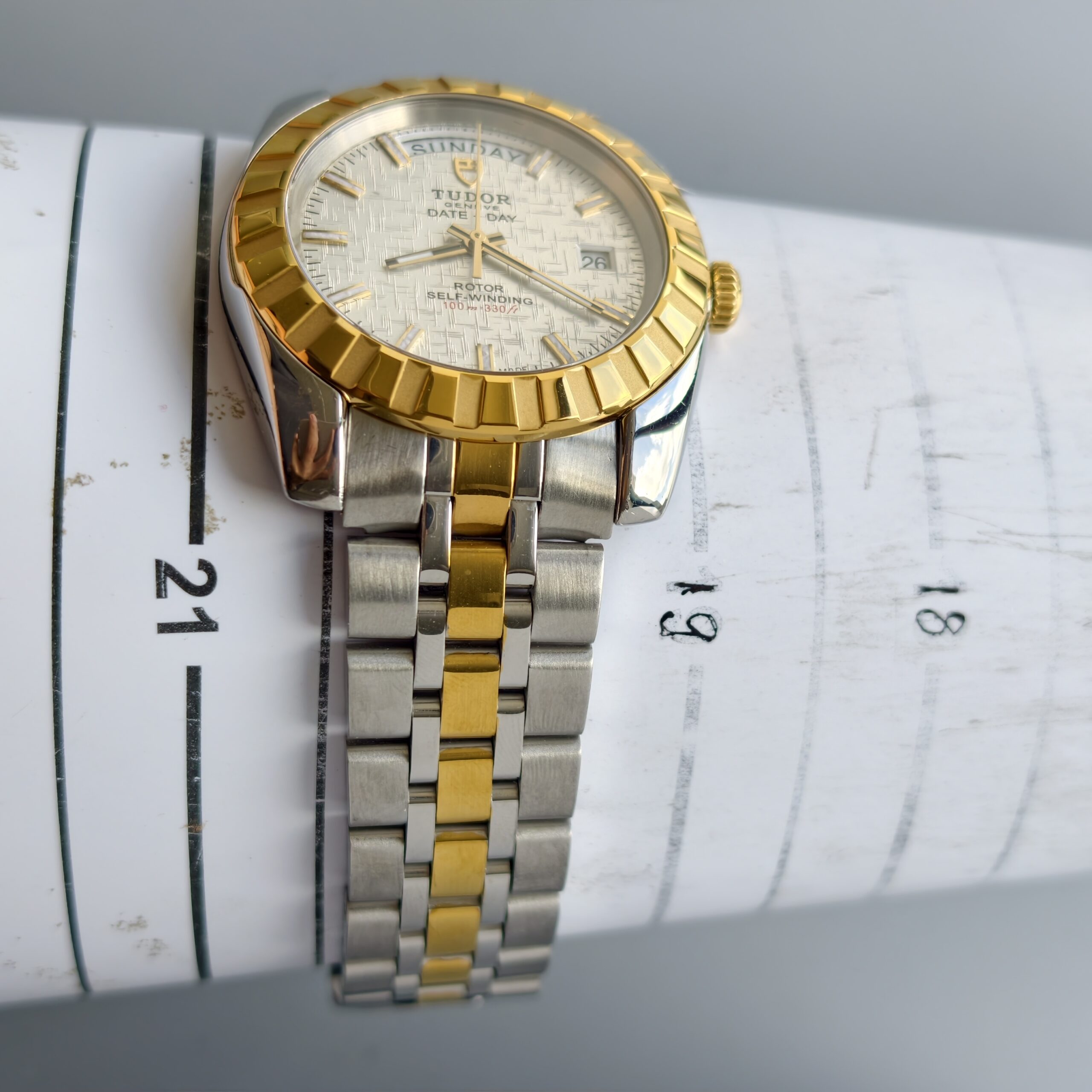 tudor classic date+day ref.m23013 0015 two tone steel & 18k yellow gold automatic watch, silver linen textured dial, original two tone bracelet, 100m water resistant tudor classic date+day ref.m23013 0015 two tone steel & 18k yellow gold automatic watch, silver linen textured dial, original two tone bracelet, 100m water resistant