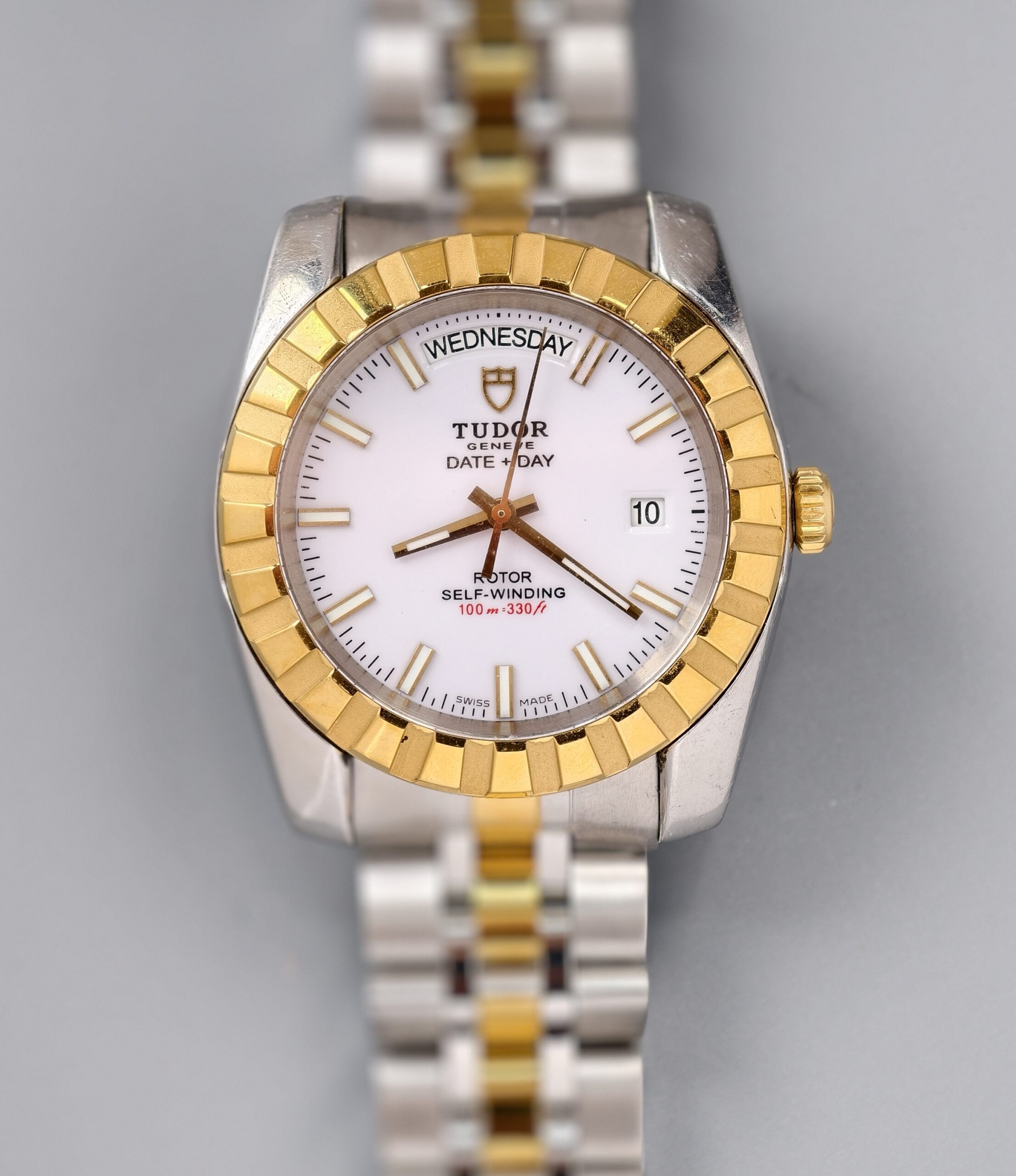 tudor classic date+day ref.m23013 0014 two tone steel & 18k yellow gold automatic watch, white dial, original two tone bracelet, 100m water resistant tudor classic date+day ref.m23013 0014 two tone steel & 18k yellow gold automatic watch, white dial, original two tone bracelet, 100m water resistant