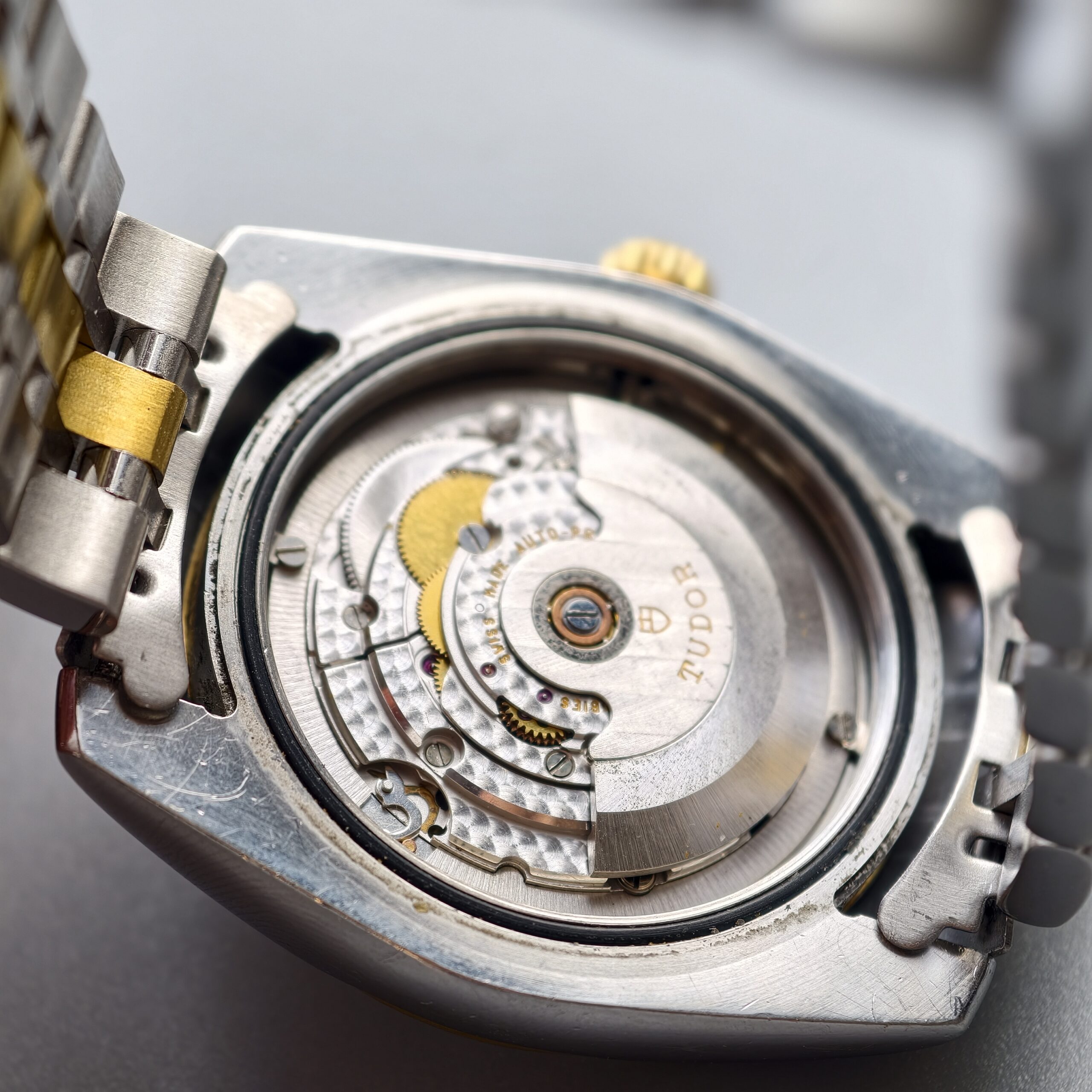 tudor classic date+day ref.m23013 0014 two tone steel & 18k yellow gold automatic watch, white dial, original two tone bracelet, 100m water resistant tudor classic date+day ref.m23013 0014 two tone steel & 18k yellow gold automatic watch, white dial, original two tone bracelet, 100m water resistant