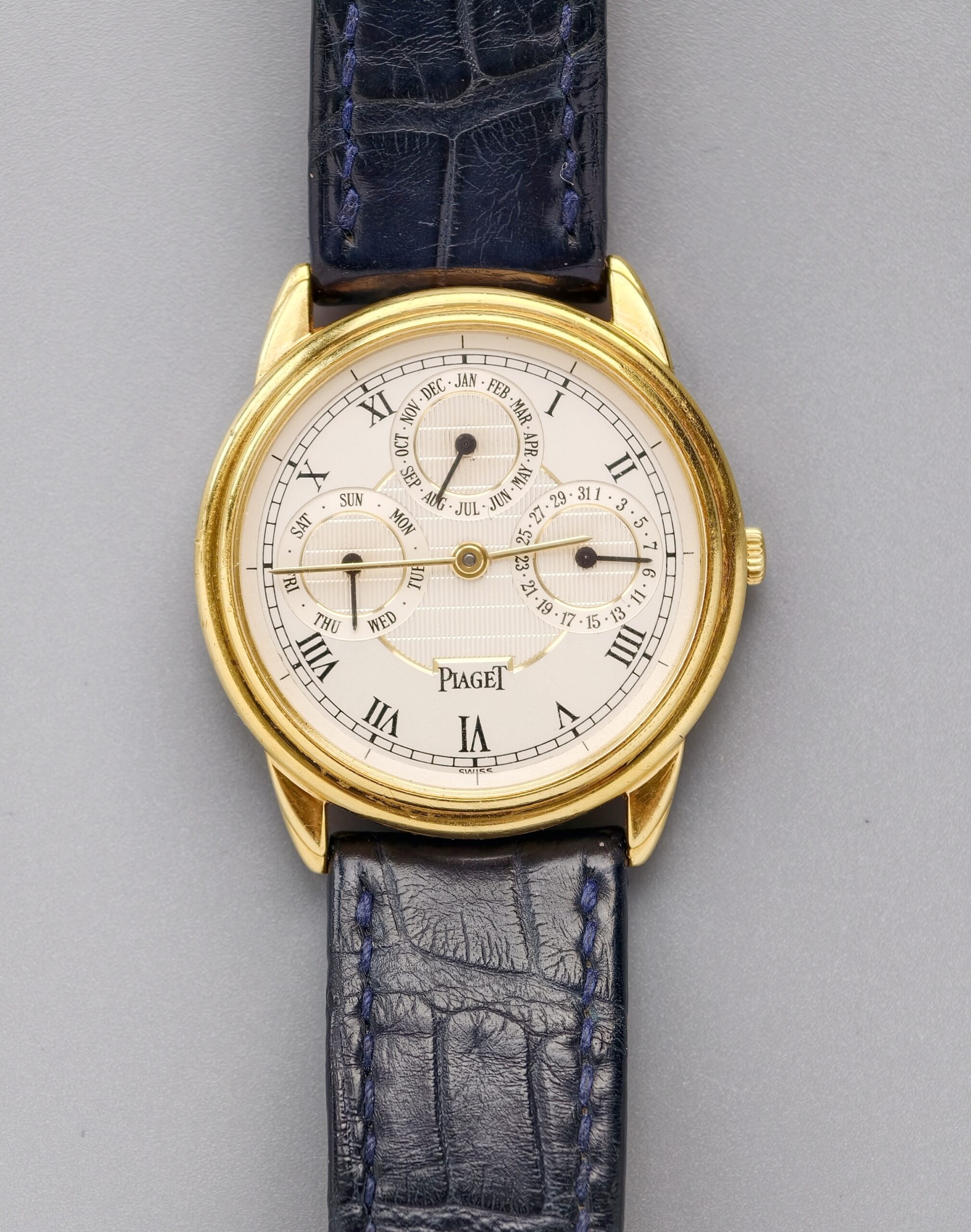 piaget gouverneur ref.15959 18k yellow gold automatic triple calendar watch, guilloché roman dial piaget gouverneur ref.15959 18k yellow gold automatic triple calendar watch, guilloché roman dial