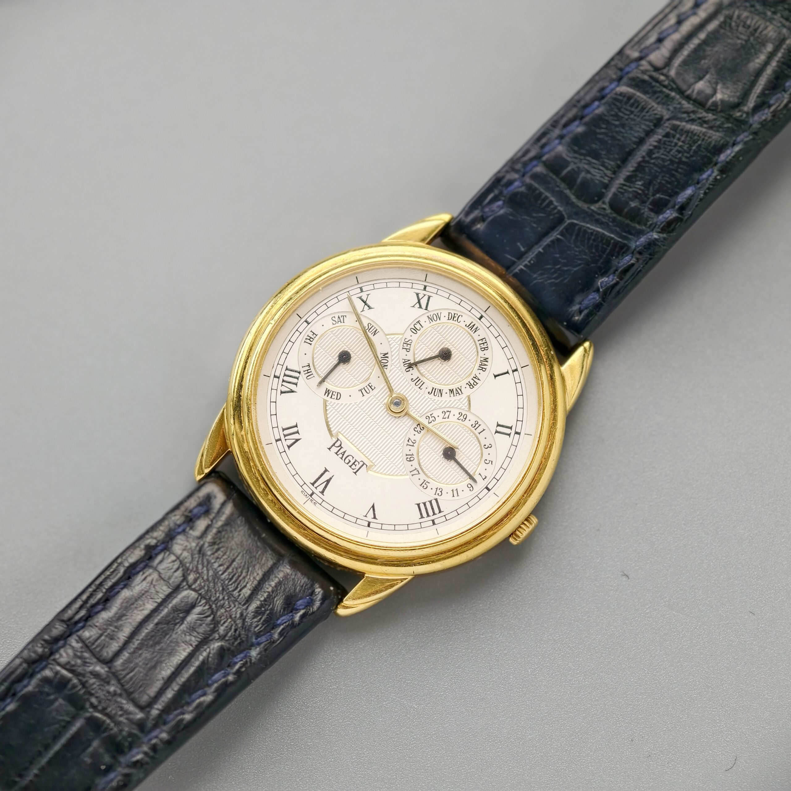 piaget gouverneur ref.15959 18k yellow gold automatic triple calendar watch, guilloché roman dial piaget gouverneur ref.15959 18k yellow gold automatic triple calendar watch, guilloché roman dial