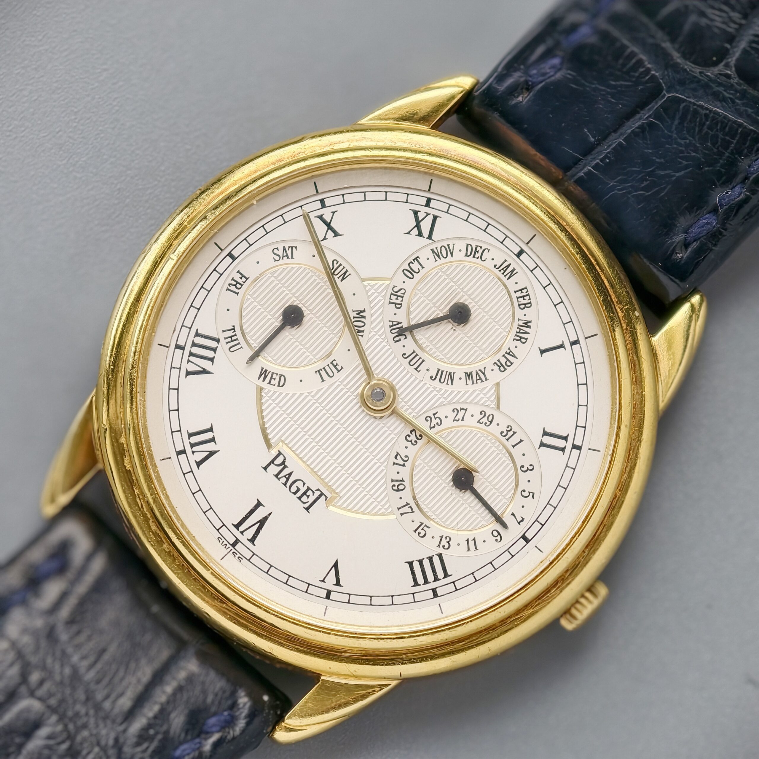 piaget gouverneur ref.15959 18k yellow gold automatic triple calendar watch, guilloché roman dial piaget gouverneur ref.15959 18k yellow gold automatic triple calendar watch, guilloché roman dial