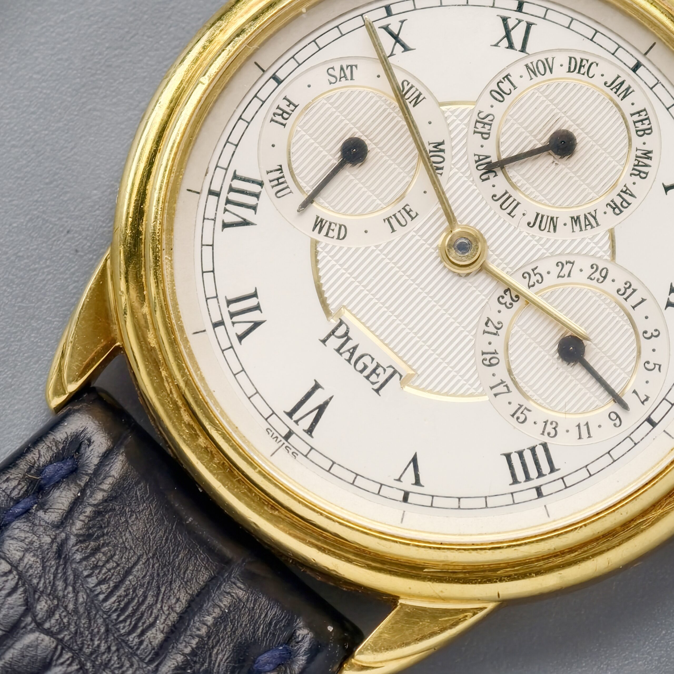 piaget gouverneur ref.15959 18k yellow gold automatic triple calendar watch, guilloché roman dial piaget gouverneur ref.15959 18k yellow gold automatic triple calendar watch, guilloché roman dial