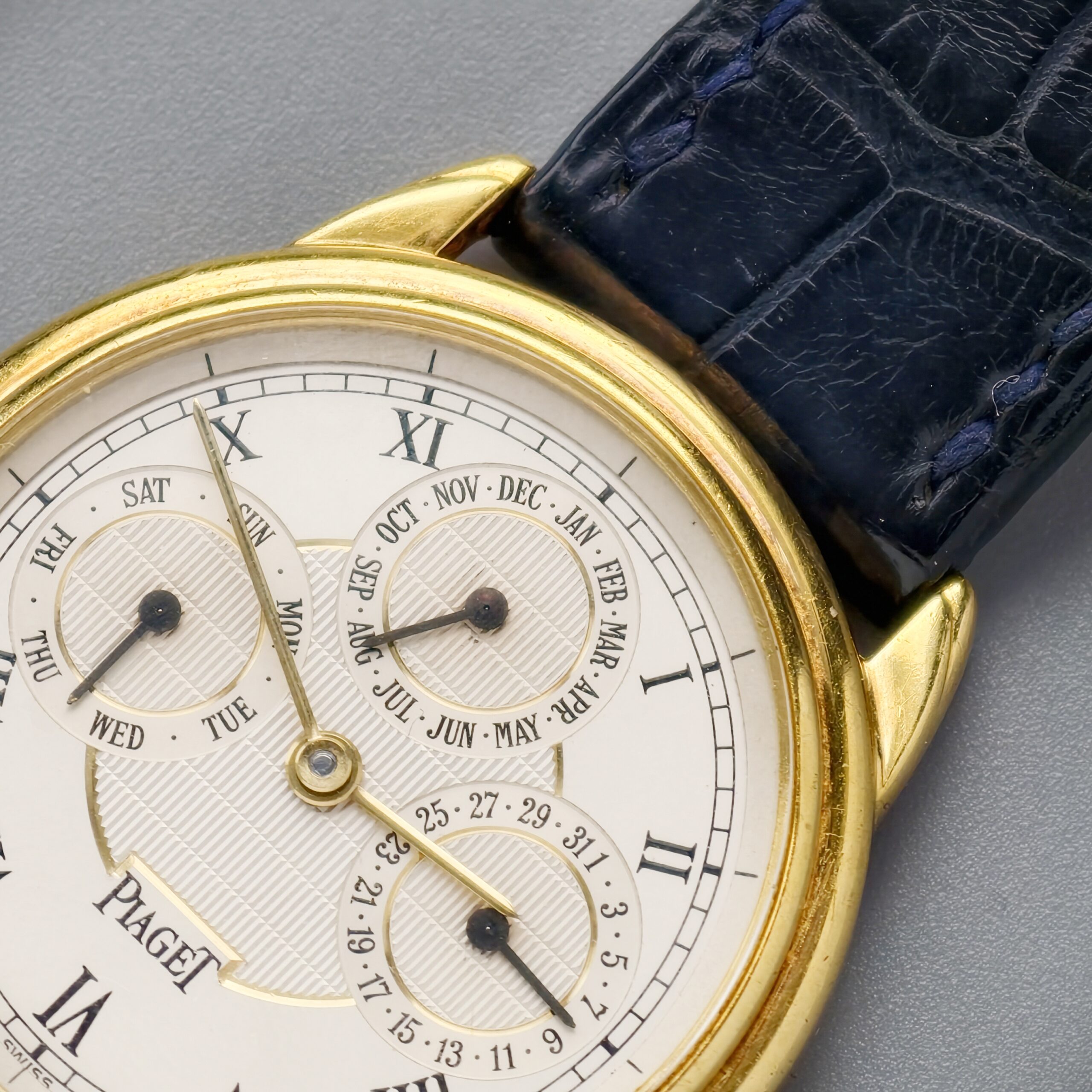 piaget gouverneur ref.15959 18k yellow gold automatic triple calendar watch, guilloché roman dial piaget gouverneur ref.15959 18k yellow gold automatic triple calendar watch, guilloché roman dial