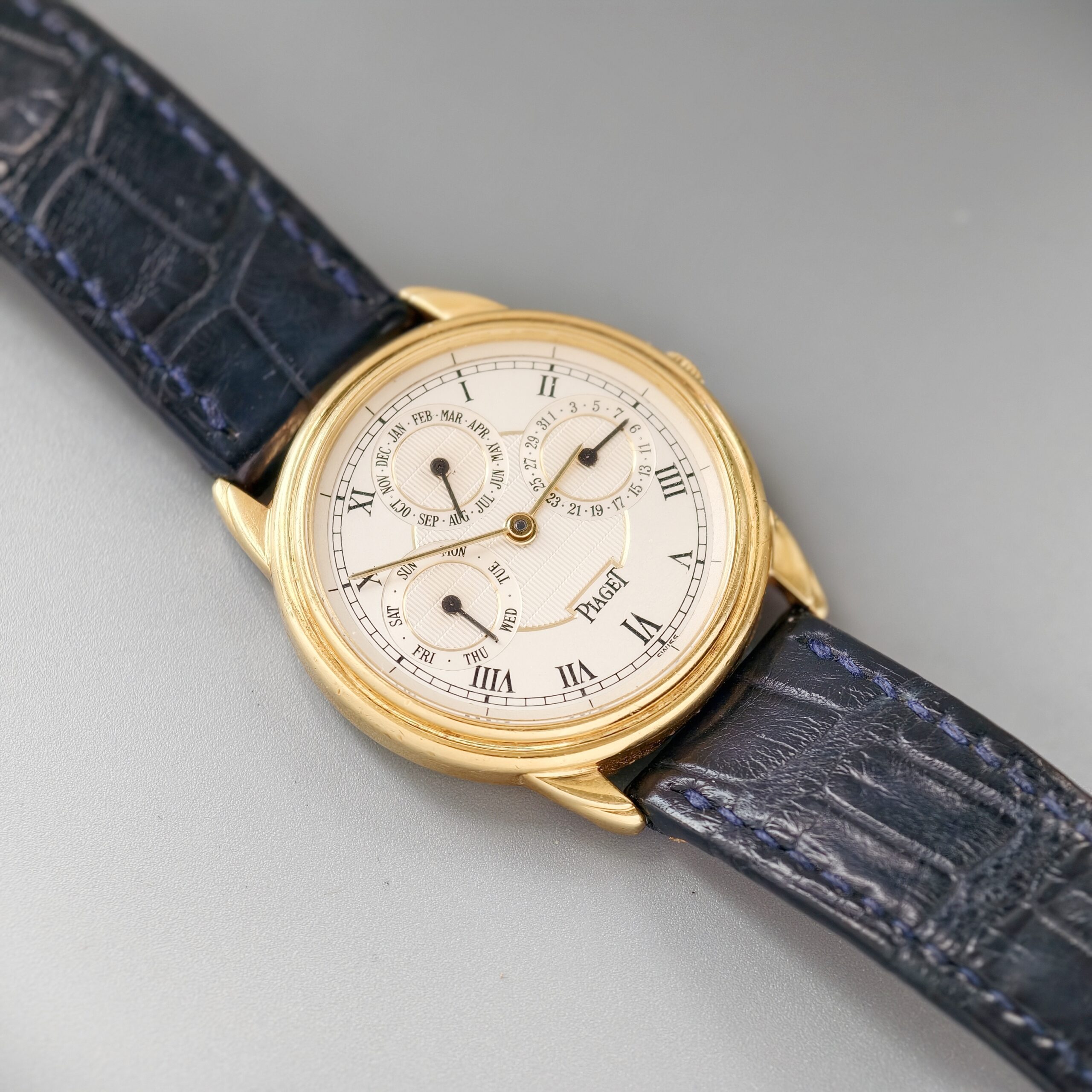 piaget gouverneur ref.15959 18k yellow gold automatic triple calendar watch, guilloché roman dial piaget gouverneur ref.15959 18k yellow gold automatic triple calendar watch, guilloché roman dial