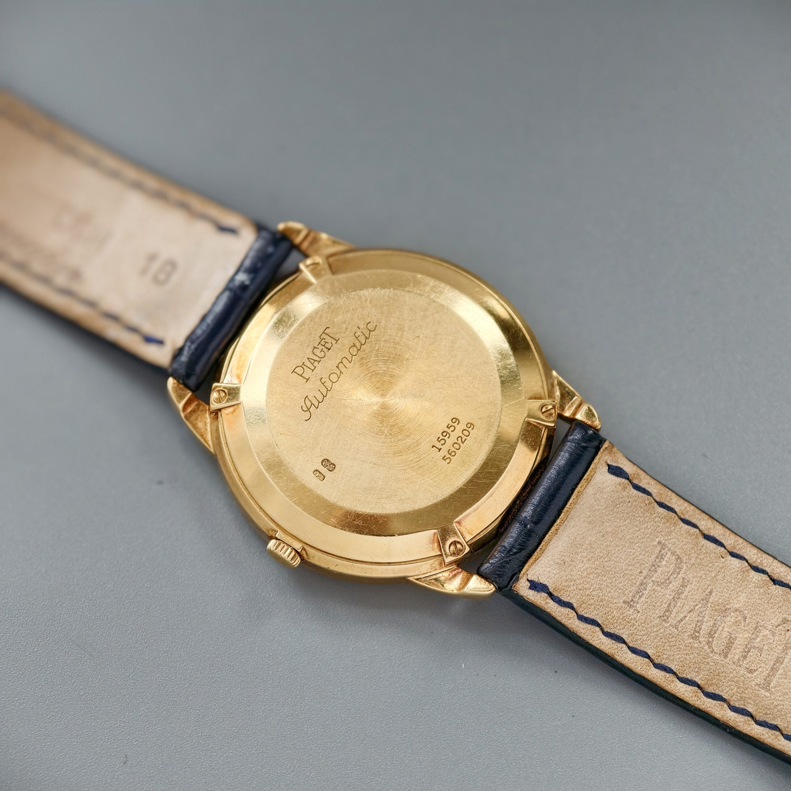 piaget gouverneur ref.15959 18k yellow gold automatic triple calendar watch, guilloché roman dial piaget gouverneur ref.15959 18k yellow gold automatic triple calendar watch, guilloché roman dial