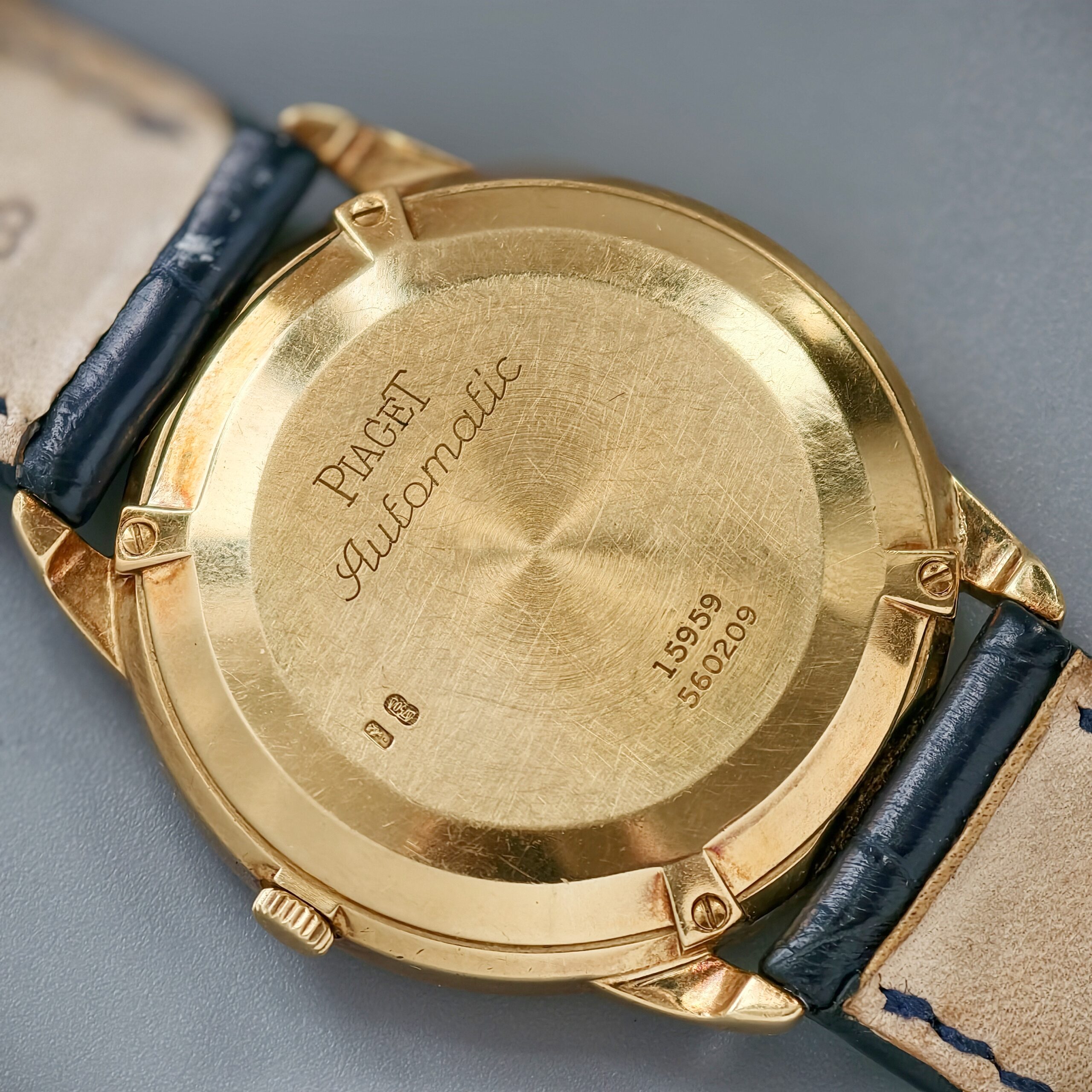 piaget gouverneur ref.15959 18k yellow gold automatic triple calendar watch, guilloché roman dial piaget gouverneur ref.15959 18k yellow gold automatic triple calendar watch, guilloché roman dial